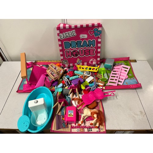 437 - Barbie dream house box with lots of accessories.