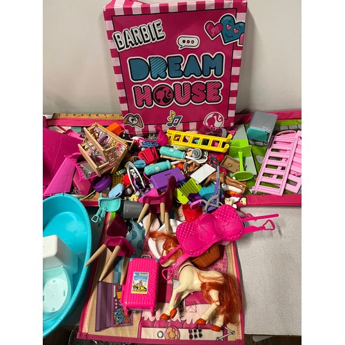 437 - Barbie dream house box with lots of accessories.