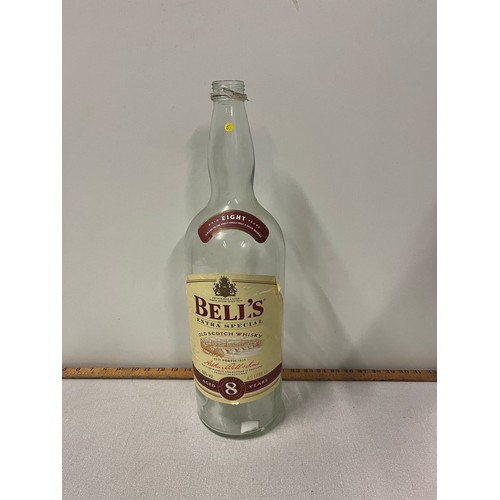 430 - Large empty bottle of Bells whisky.