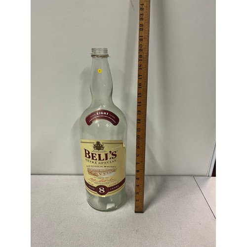 430 - Large empty bottle of Bells whisky.