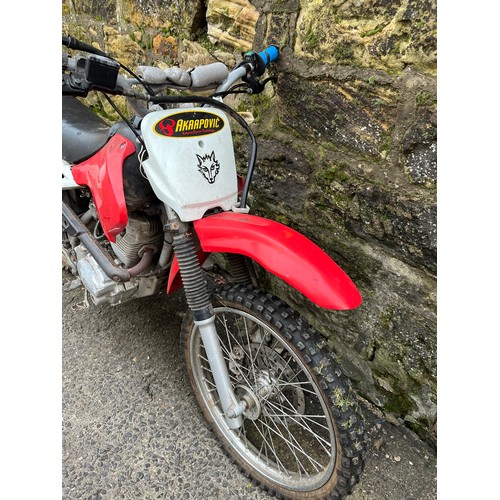 322 - Xtreme DNA 125cc motorcross bike , the bike does run however has been sitting about & can do with se... 