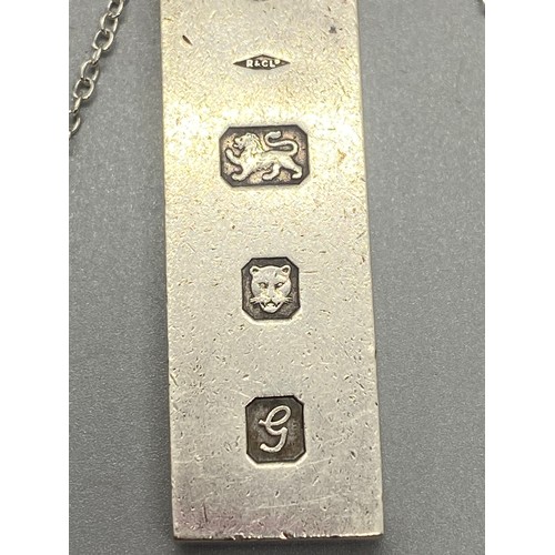 255 - Silver ingot pendant and silver chain. 32.14g