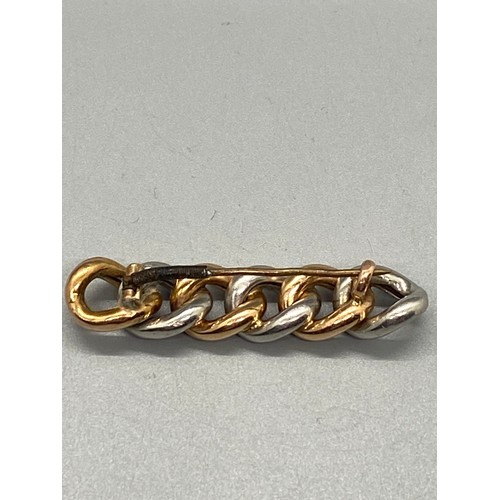 258 - Victorian chain link bar brooch testing as platinum and 14ct gold. 8.6g