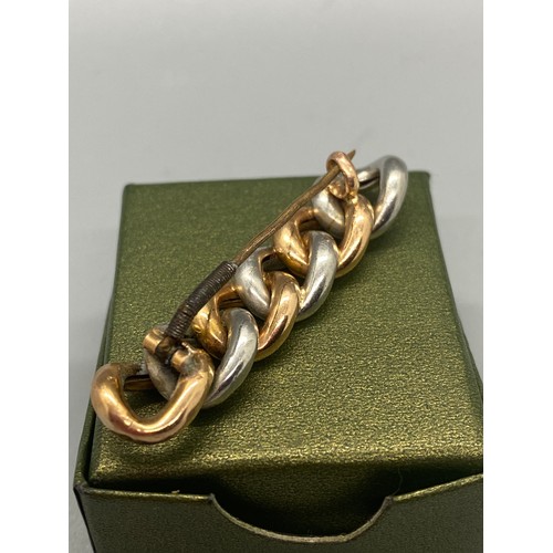 258 - Victorian chain link bar brooch testing as platinum and 14ct gold. 8.6g