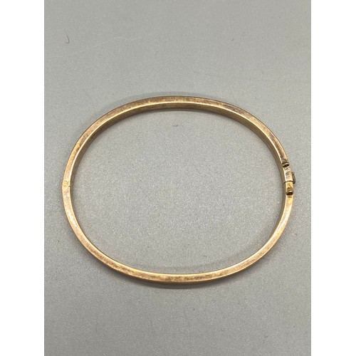 259 - 15ct gold bangle 7.7g