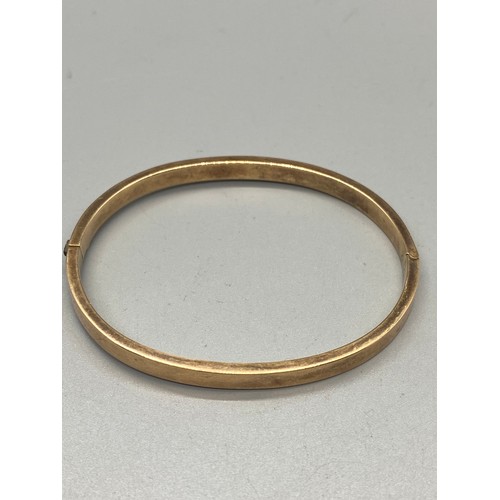 259 - 15ct gold bangle 7.7g