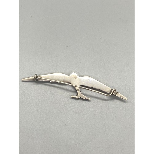 268 - Unusual etched art deco flying swallow bird. Possibly silver -unmarked.