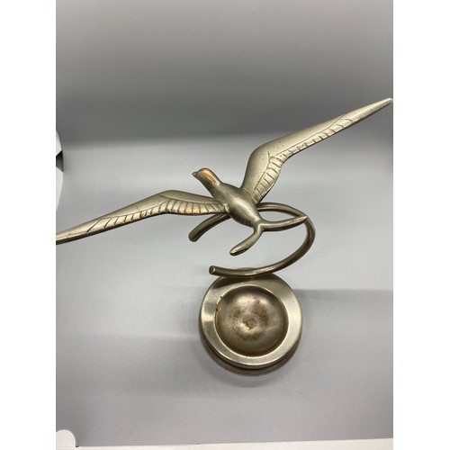 269 - Heavy desktop art deco silvered brass/bronze flying swallow figure on base.