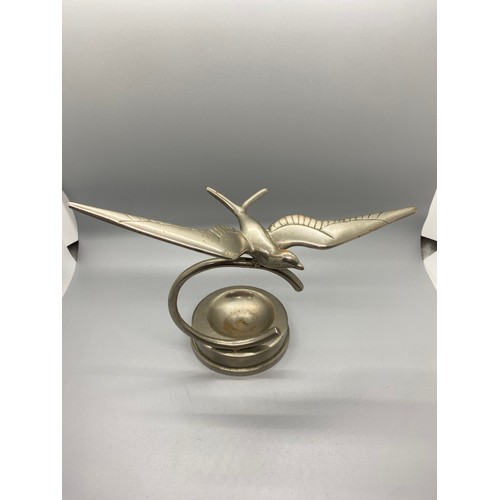 269 - Heavy desktop art deco silvered brass/bronze flying swallow figure on base.