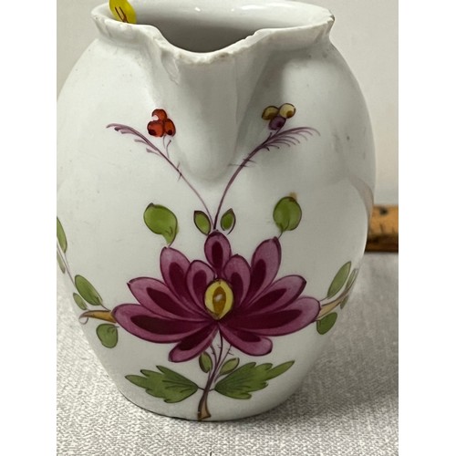 56 - Early Meissen jug.