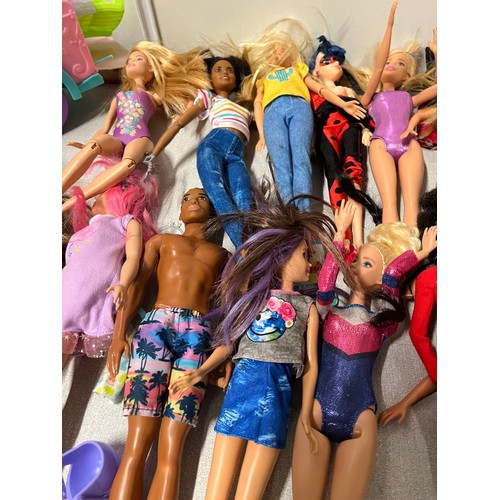 327 - Large collection of Barbie dolls and accessories.