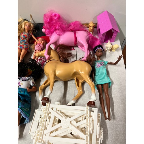 327 - Large collection of Barbie dolls and accessories.