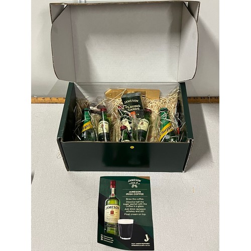 75 - Jamieson's whisky gift set to include 4 miniatures, 2 schwepps ginger ale, jigger, glasses & playing... 