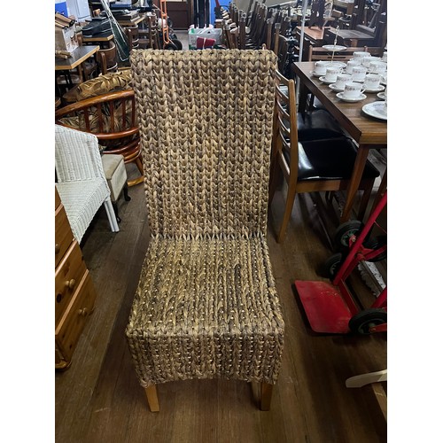 330 - set of 4 wicker dining chairs.