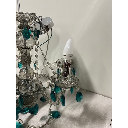 159 - Chandelier with turquoise pendants.