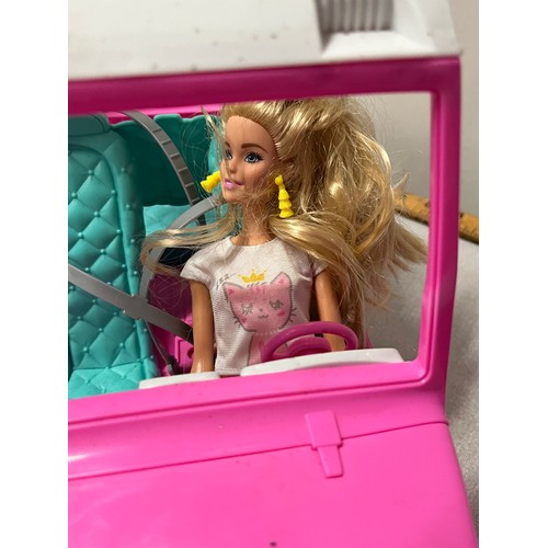 379 - Barbie snack van and Jeep along with two Barbie dolls.
Largest 42cm l