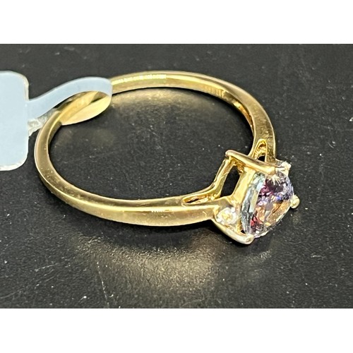 6 - 10k yellow gold and tanzanite solitaire ring.