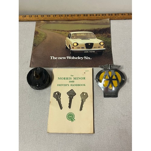 26 - Vintage AA badge, Wolesley six & Morris Minor handbooks, AA & RAC keys (3) & petrol cap.