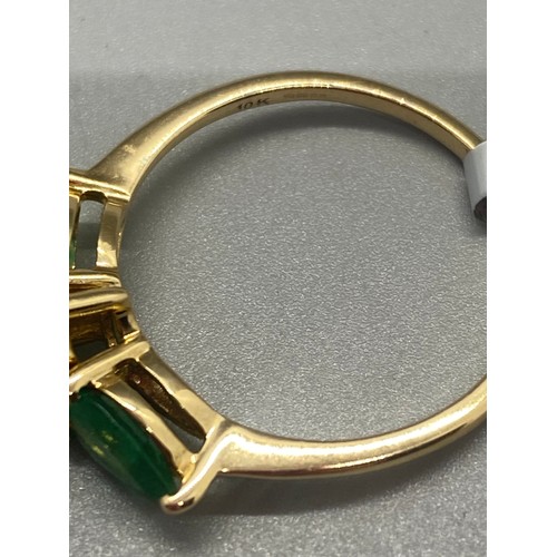 8 - 10k gold ladies ring with 3 emerald stones