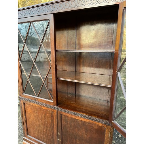 27 - Antique mahogany bookcase on ball & claw feet.
92cm w x 152cm h x 30cm d