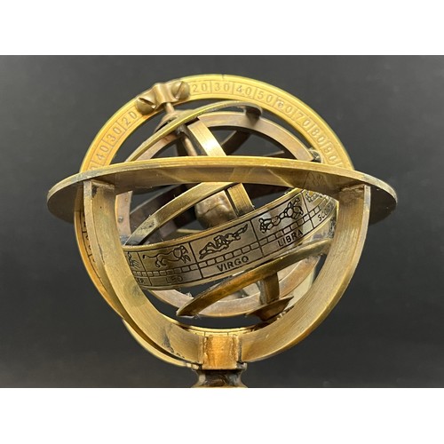 164 - Vintage Armillary brass desktop globe on wooden base.
14cm h