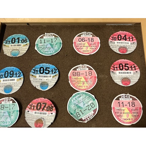 313 - quantity of tax discs framed