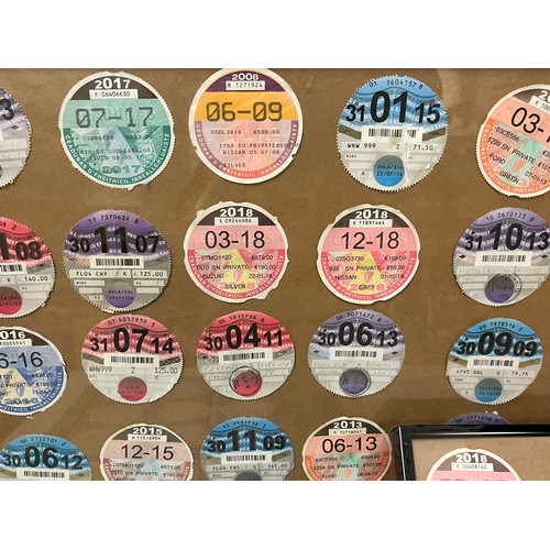 323 - quantity of tax discs framed