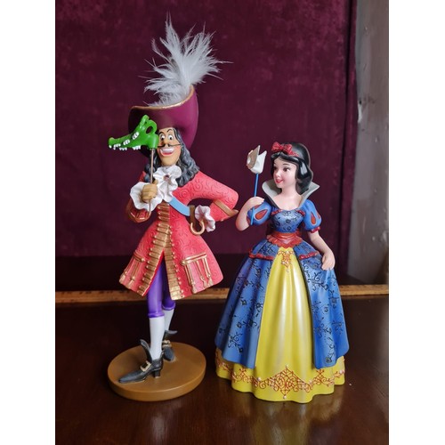 201 - Disney Showcase Collection 'Captain hook masquerade' & 'Snow White masquerade' figurines
Tallest 24c... 