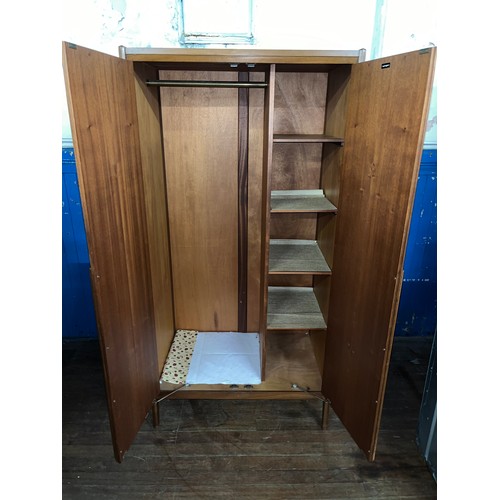 200 - Mid Century teak bedroom set by Younger consisting of 2 wardrobes & headboard with drawers.
Wardrobe... 