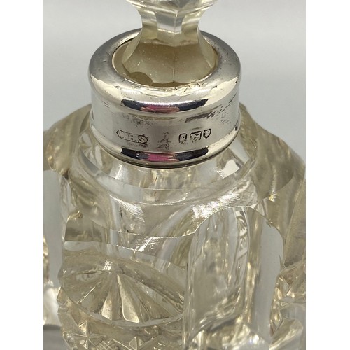 117 - Vintage cut glass scent bottle with silver collar.