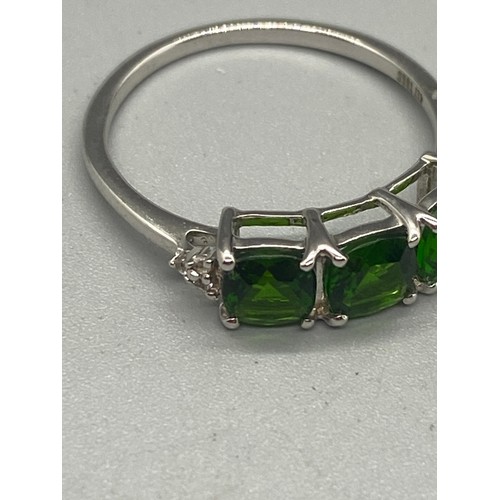 3 - 10k white gold, peridot and diamond 3 stone ring.