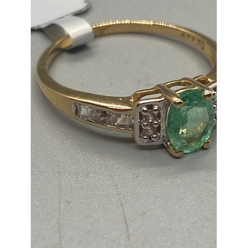 7 - 10k yellow gold, emerald and diamond ring.