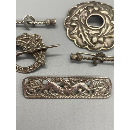 156 - 4 silver brooches and 1 other plated Victorian thistle design brooch, Glasgow silver ornate celtic d... 