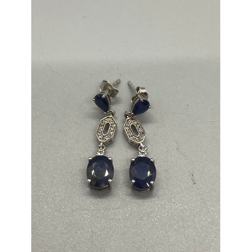 172 - Madagascan blue sapphire, white topaz and sterling silver earrings.