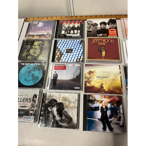 305 - Selection of CD's to include The Killers, Amy Winehouse & Calvin Harris 18 Months signed by Calvin H... 