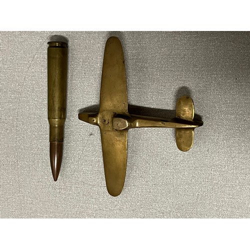 54 - Heavy brass Trench art plane along with old bullet.