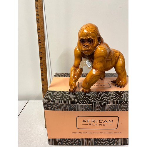 66 - Large boxed African Plains wooden Gorilla ornament.
30cm h x 30cm w