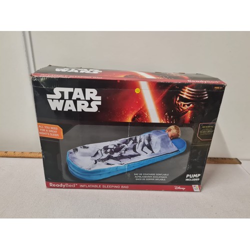 414 - New Boxed Star Wars inflatable ready bed.