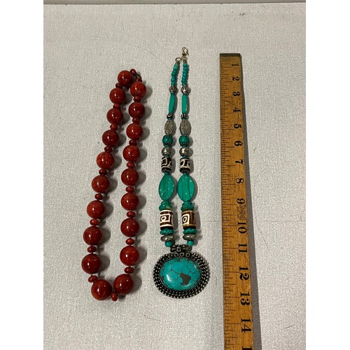 510 - Navajo style beaded necklace along with red malachite beaded necklace both large