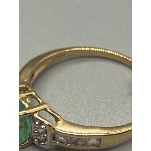 7 - 10k yellow gold, emerald and diamond ring.