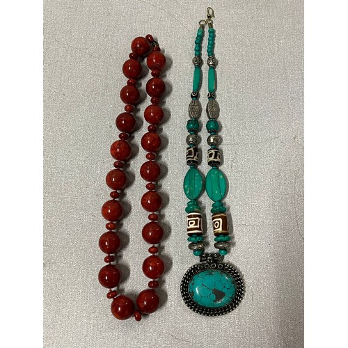 510 - Navajo style beaded necklace along with red malachite beaded necklace both large