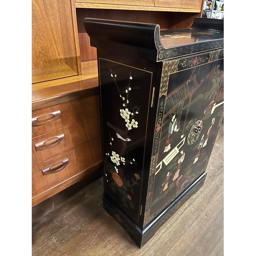 79 - Black lacquered oriental 2 door cabinet.
101cm x 70cm x 30cm