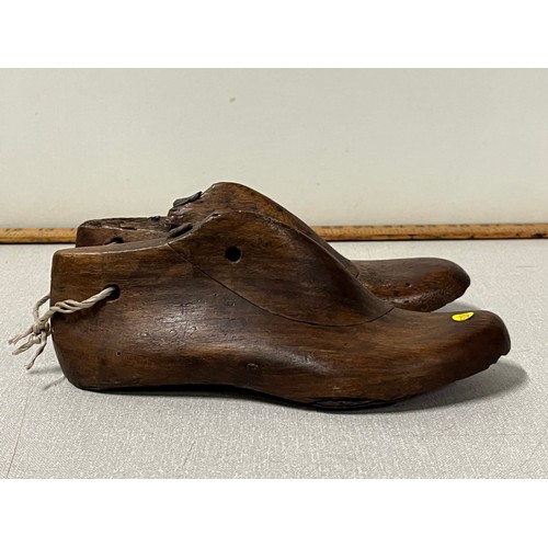 111 - Pair of antique wooden shoe lasts.