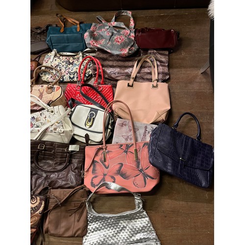 411 - Large collection of over 40 handbags to include new & used.