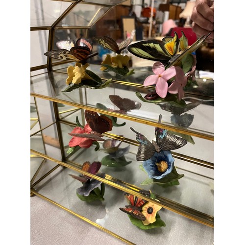 49 - collection of franklin mint ceramic butterfies along with 3 glass display cabinets