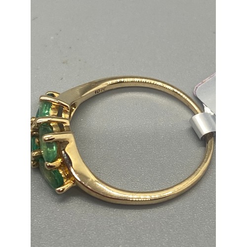 38 - 10k yellow gold, 5 emerald  ring.