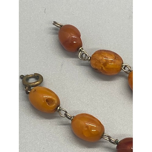 39 - Raw amber graduating necklace.
21.97g