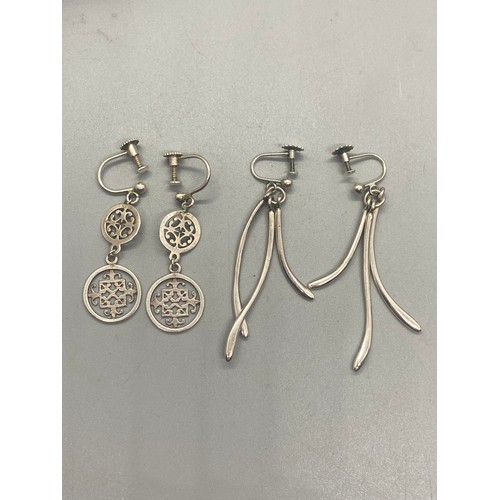 42 - 2 pairs of silver drop earrings and 925 silver gem set ring.