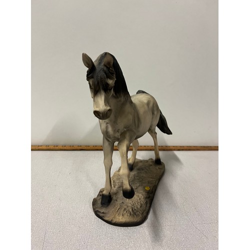 249 - Large horse ornament. 30cm long