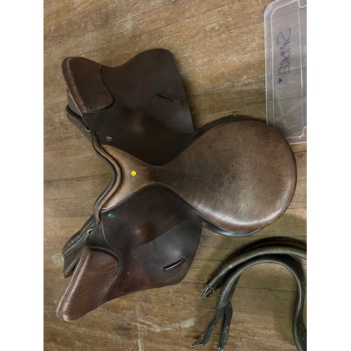 272 - Ideal Leather horse saddle along with 2 boxes of horse items